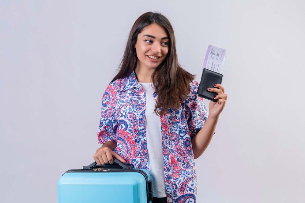 beautiful-tourist-woman-holding-travel-suitcase-passport-with-tickets-looking-aside-with-smile-face-happy-positive-travel-concept-standing_141793-22037